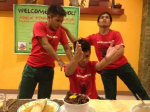 Three dancers, including Marlon (right) welcomed Adele Finney to Bohol. Photo: Adele Finney