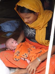 Toslima and her newborn baby. World Renew photo.